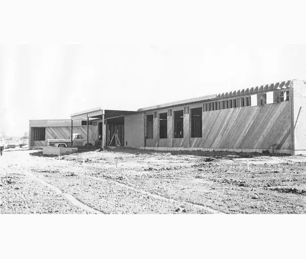 A black and white photo of an old building.