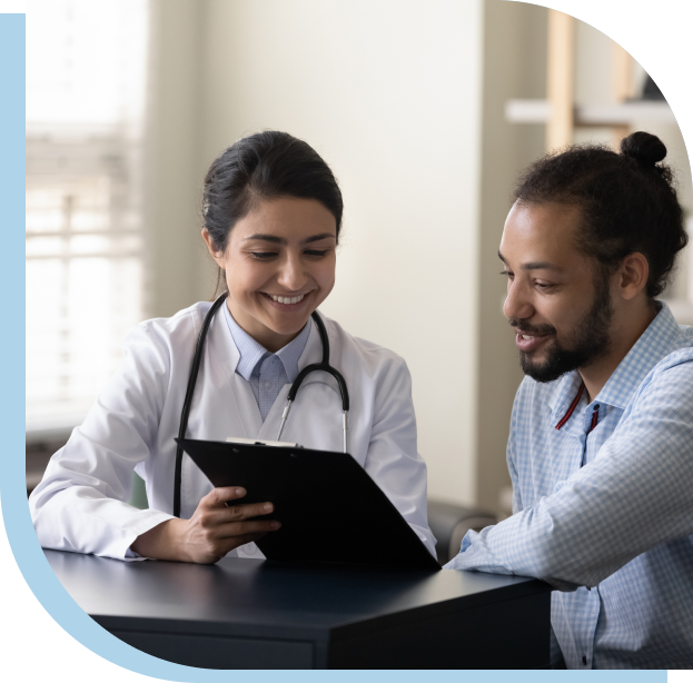 A doctor and patient looking at a tablet.